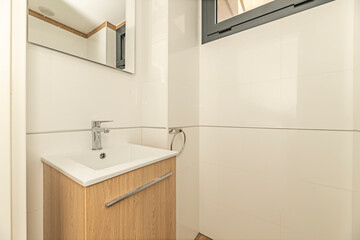 Natural wood wall-mounted vanity unit with three drawers, perfect for organizing products in compact spaces