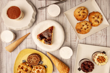 Oatmeal cookies with shredded coconut and milk chocolate chips, crispy on the outside and soft on the inside, ideal for a snack