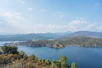 sunrise captured with long exposure, transforming the water into a silken surface under mauve skies