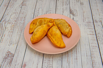 Colombian empanadas are traditionally served with chili or hot sauce