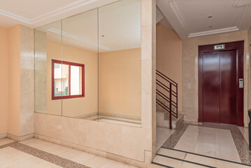 Elevator with faux leather interior trim, backlit keypad, and silent ventilation system