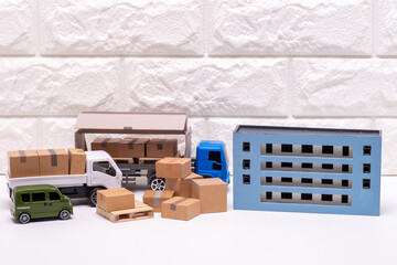 段ボール箱と配送センターのイメージ