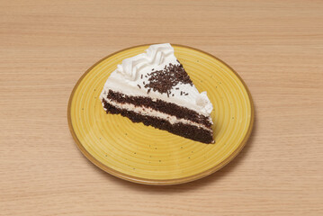 American brownie-style chocolate cake with walnuts and vanilla ice cream