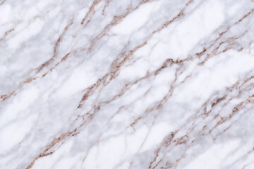 White marble texture. Surface natural white marble with brown and gray color veins, background, close-up, high resolution.