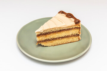 White chocolate and mango cake with coconut cream, lime zest, and toasted almonds