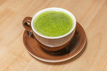 Hot steam gently rising from a cup of hot matcha tea, captured isolated on a transparent background in a vector illustration