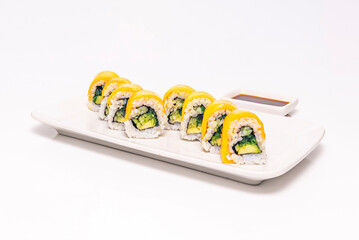 mango uramaki with fresh cilantro, rolled in toasted sesame seeds on porcelain