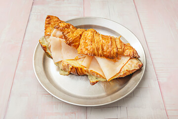 Classic ham sandwich with Edam cheese and butter on traditional untoasted white bread