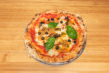 Wild Asparagus Pizza with fresh grilled asparagus, ricotta cheese, and aged Parmesan shavings