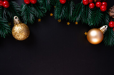 Christmas Border with Gold Ornaments on Black Background