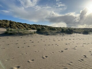 sand dunes and clouds