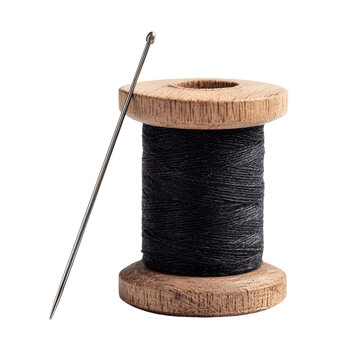 Vintage wooden spool of black thread with a needle on black background