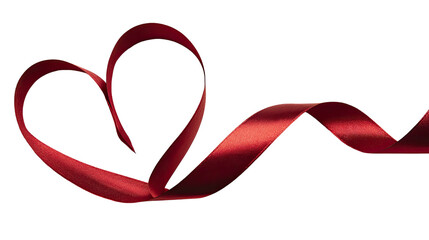 Red heart-shaped candy canes with a red satin ribbon bow decoration symbolize love for a holiday celebration