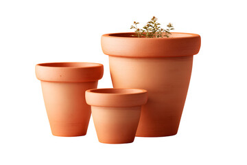 Fototapeta premium Three terracotta flower pots of different sizes on black background