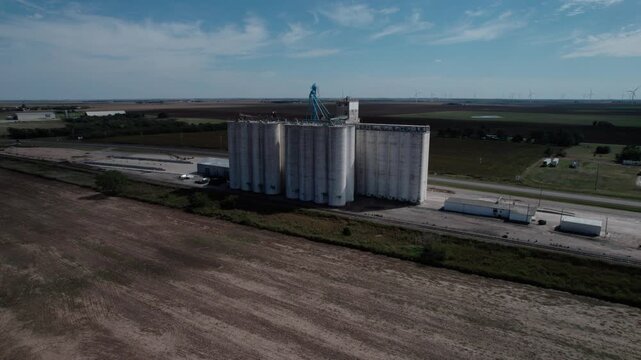 Aerial of old grain elevators in farm country