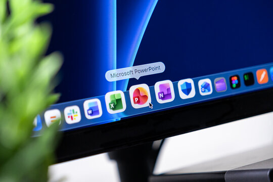 Poznan, Poland - October 16, 2025: Microsoft PowerPoint, its icon on screen, selected by mouse, vital for digital business presentations