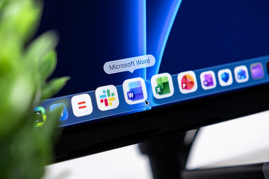 Poznan, Poland - October 16, 2025: Microsoft Word application icon highlighted by a mouse cursor on a desktop computer screen, displaying office productivity tools
