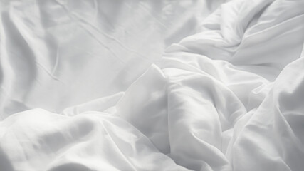 Soft white wrinkled duvet bed sheet texture, minimal background for comfort, cleanliness, and...
