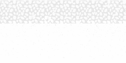 Abstract light gray background with a speckled pattern and subtle texture