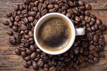 Fototapeta premium Aromatic Coffee Cup Surrounded by Beans on Tabletop