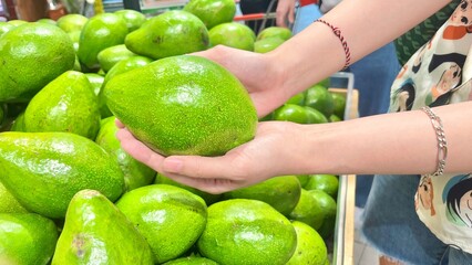 woman hands holding fruits
