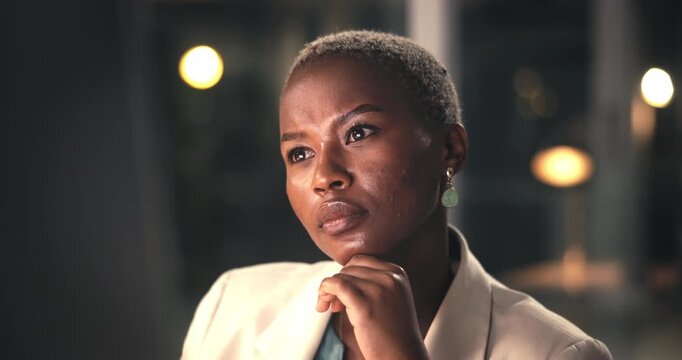 Reading, night or black woman in office with desktop, fact checking or approval of research report. Bokeh, information or employee in agency with tech, solution and review of online paper in overtime