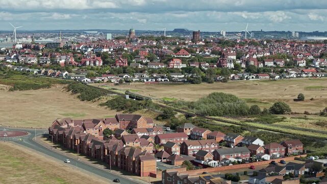 Aerial view of suburban housing in New Brighton with Wallasey houses in the background, Wirral, England