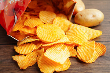 Potato chips , delicious BBQ seasoning spicy for crips, thin slice deep fried snack fast food.