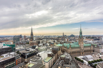 Obraz premium Rooftop view over Hamburg city center with historic Town Hall and church towers, Germany