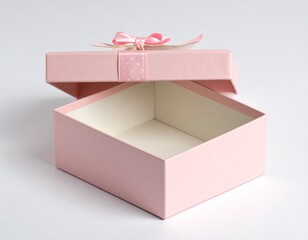 白背景に蓋が開いている一個のピンクのプレゼントの箱