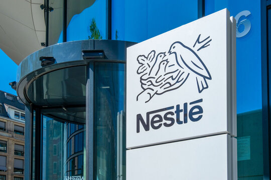 office Nestle with logo, milk company, food manufacturer, instant coffee, chocolate, dairy products, pet food, pharmaceuticals professional business in Frankfurt, Germany