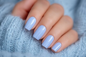 Close up of professional woman hand model showcasing elegant nail manicure with soft baby blue pastel color and classic French manicure style. Beauty salon cosmetics and luxury nail care treatment.