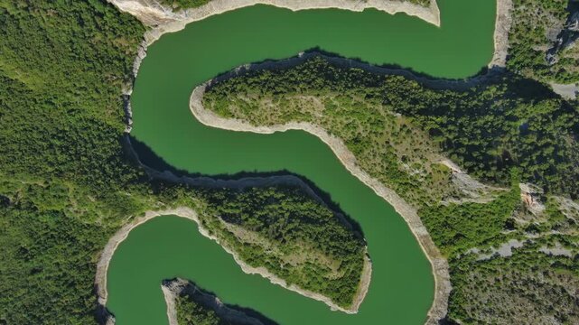Aerial top view of curved meanders in canyon of Uvac river, Serbia, 4k