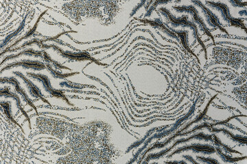 Light beige-gray jacquard fabric texture with metallic lurex and blue-gray abstract pattern, textile collection