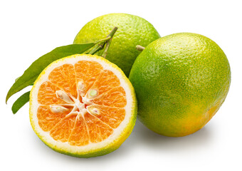 Green tangerine and cross section of tangerine fruit isolated on white background. File contains clipping paths.