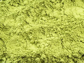 Matcha tea, finely ground powder of green tea  close up.