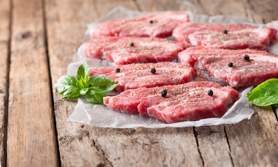 Fresh raw meat on grill plate