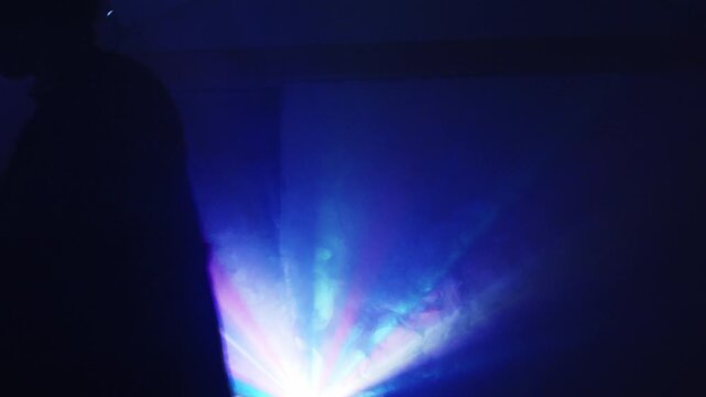 Capturing moments with light rays and camcorder silhouette at twilight