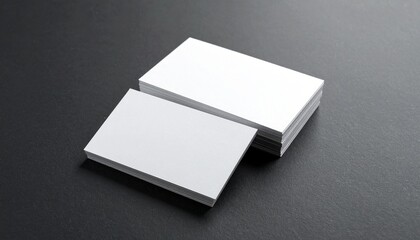 Blank White Business Card Mockup on Black Background.