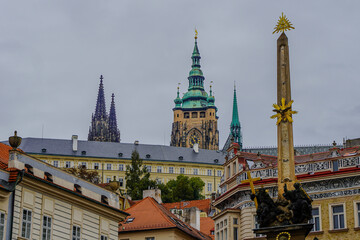 Fototapeta premium Beautiful aerial and detailed view of Prague Castle with St. Vitus Cathedral and the Old Royal Palace, Czech Republic — Gothic architecture and panoramic city skyline