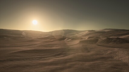 Sunlight casts a warm glow over vast sand dunes, creating a serene atmosphere. The horizon is filled with gentle hills, softly illuminated by the setting sun, evoking a sense of peace and beauty.