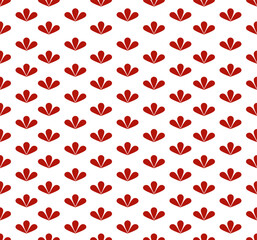 Repeating pattern of red, stylized floral motifs on a white background used for textiles, wrapping paper, or other decorative purposes.