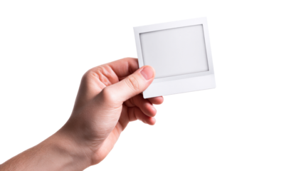 hand holding a empty polaroid photo template. blank photo frame mockup. Vintage Card on transparent background