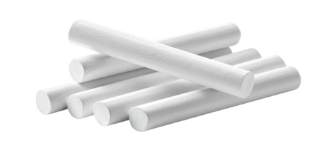 A close-up shot of a small collection of white cylindrical objects. They are arranged in a pile