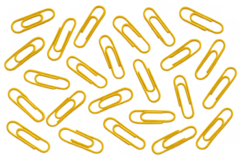 Yellow paper clips scattered creating pattern on transparent background