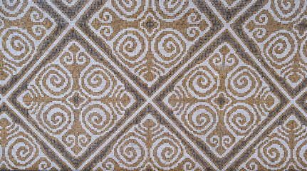 Kazakh tiled ornament on a wall. Mosaic of Kazakh ornament.
