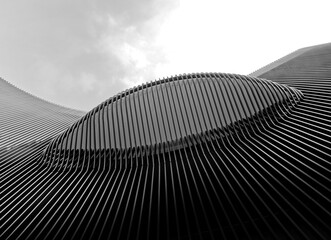 Modern Building Facade Curve Wall Steel Pattern Metalwork Texture low Angle view Architecture details