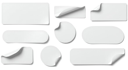 Obraz premium Collection of blank white paper stickers and labels isolated on white background