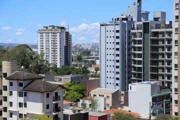 Living in a big city. Lifestyle in apatrment buildings, modern architecture with balance on facilities and nature. Santo Andre city, Sao Paulo, Brazil