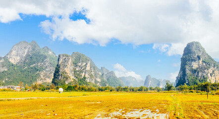 Beautiful rural landscape surrounded by Karst mountains in winter at Mingshi Village (Mingshi Tianyuan) in Daxin County, Chongzuo city, Guangxi, China